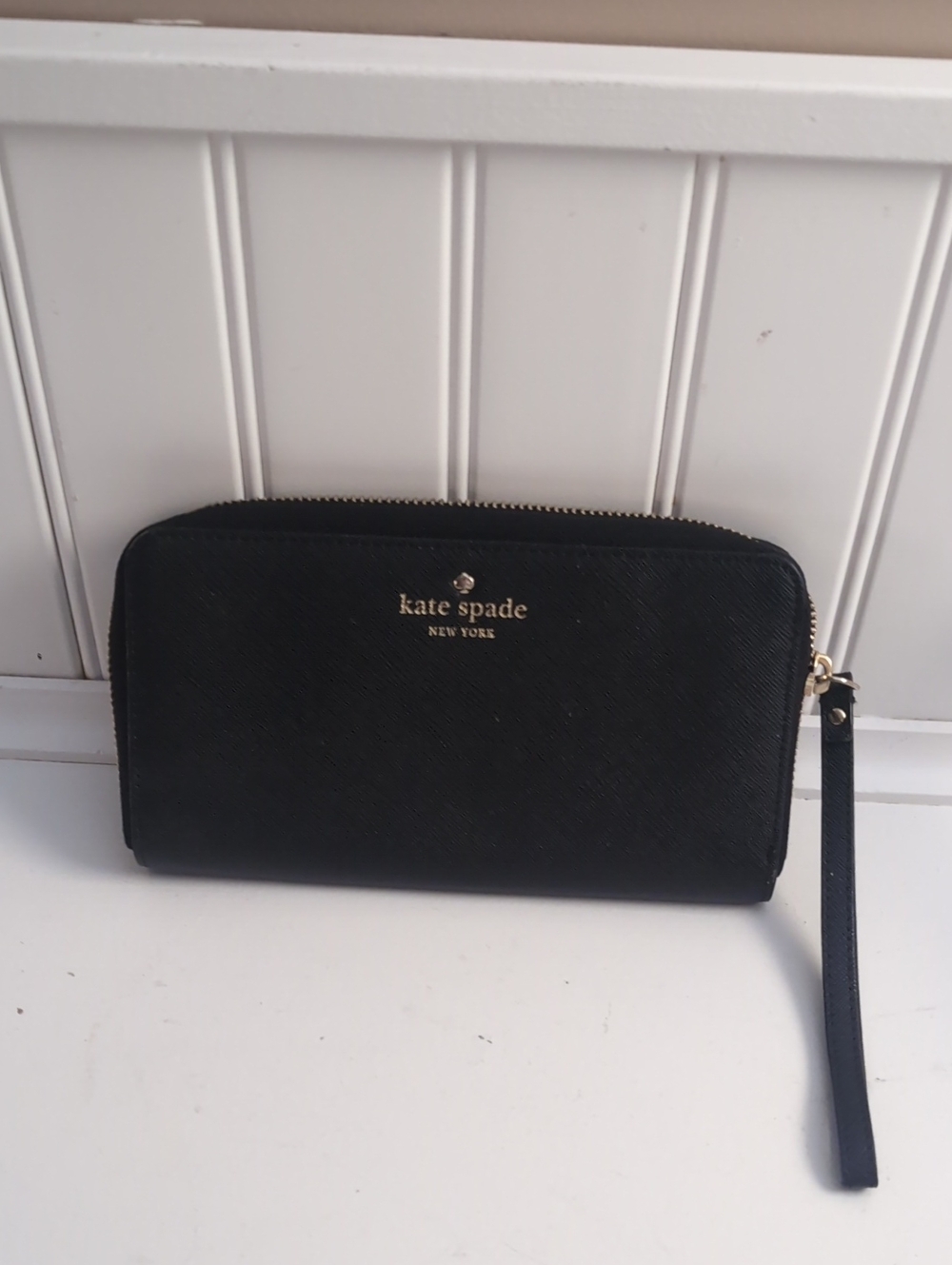 kate spade black zip-around wristlet wallet with gold logo